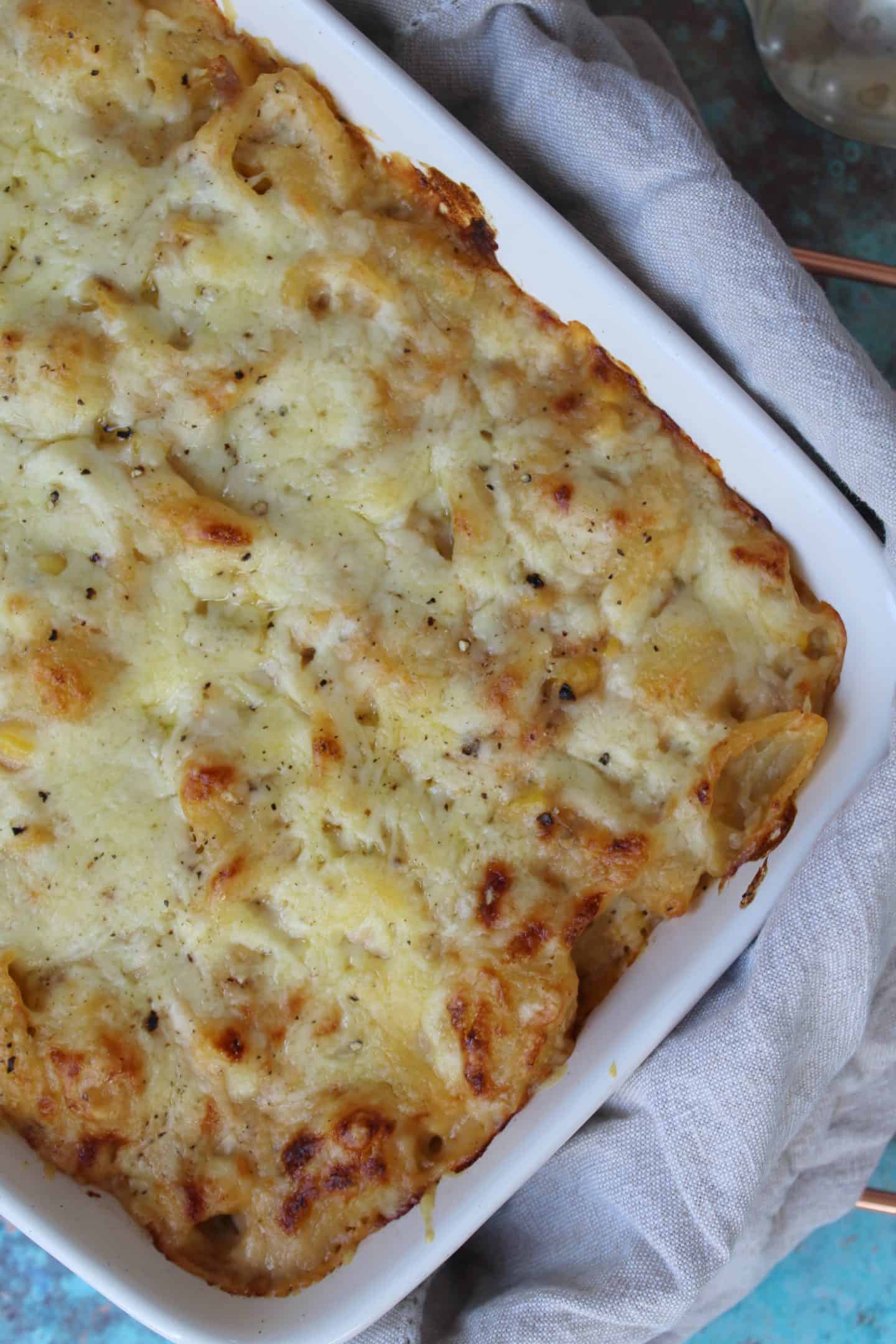 A gluten free tuna pasta bake recipe with a cheesy top.