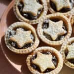 A plate of gluten free mince pies with star tops.