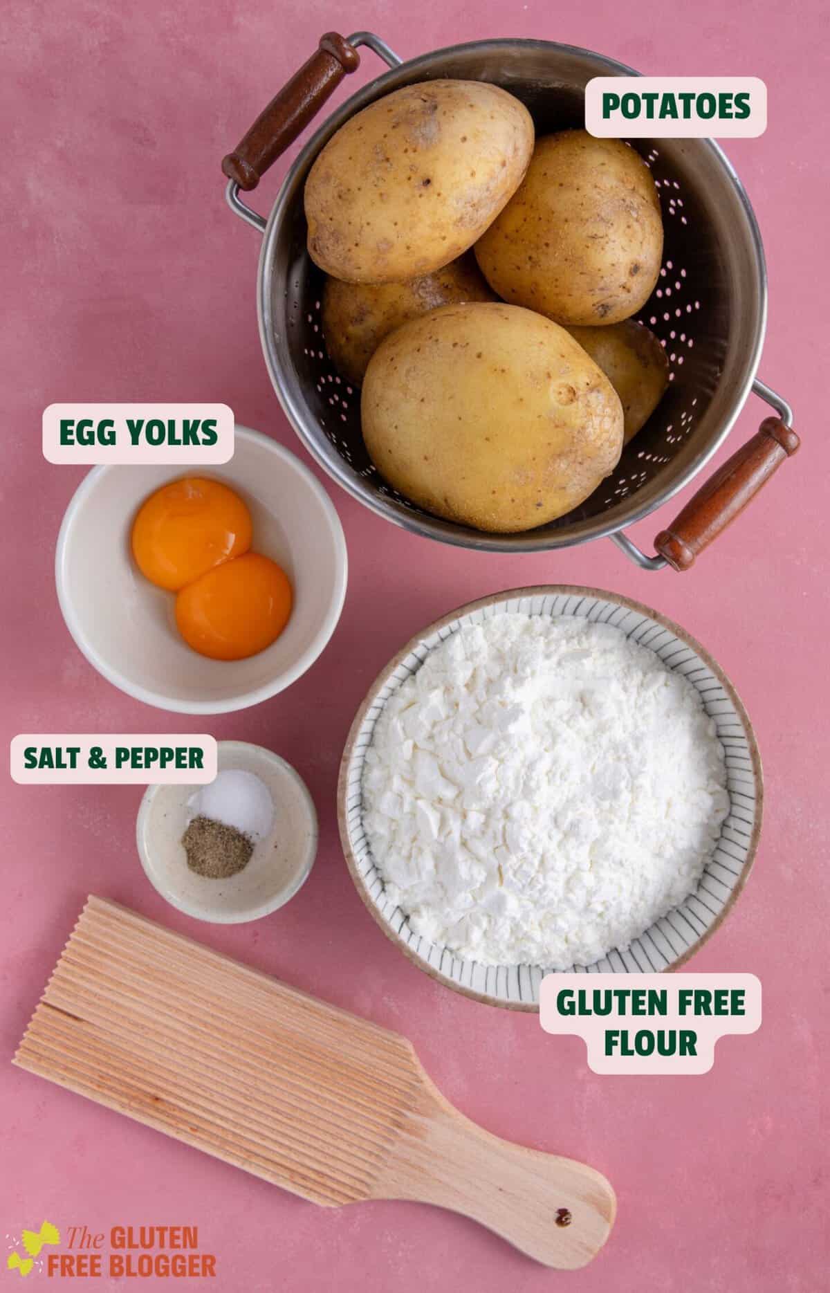 Ingredients for gluten free gnocchi with text labels including potatoes, flour and egg yolks.
