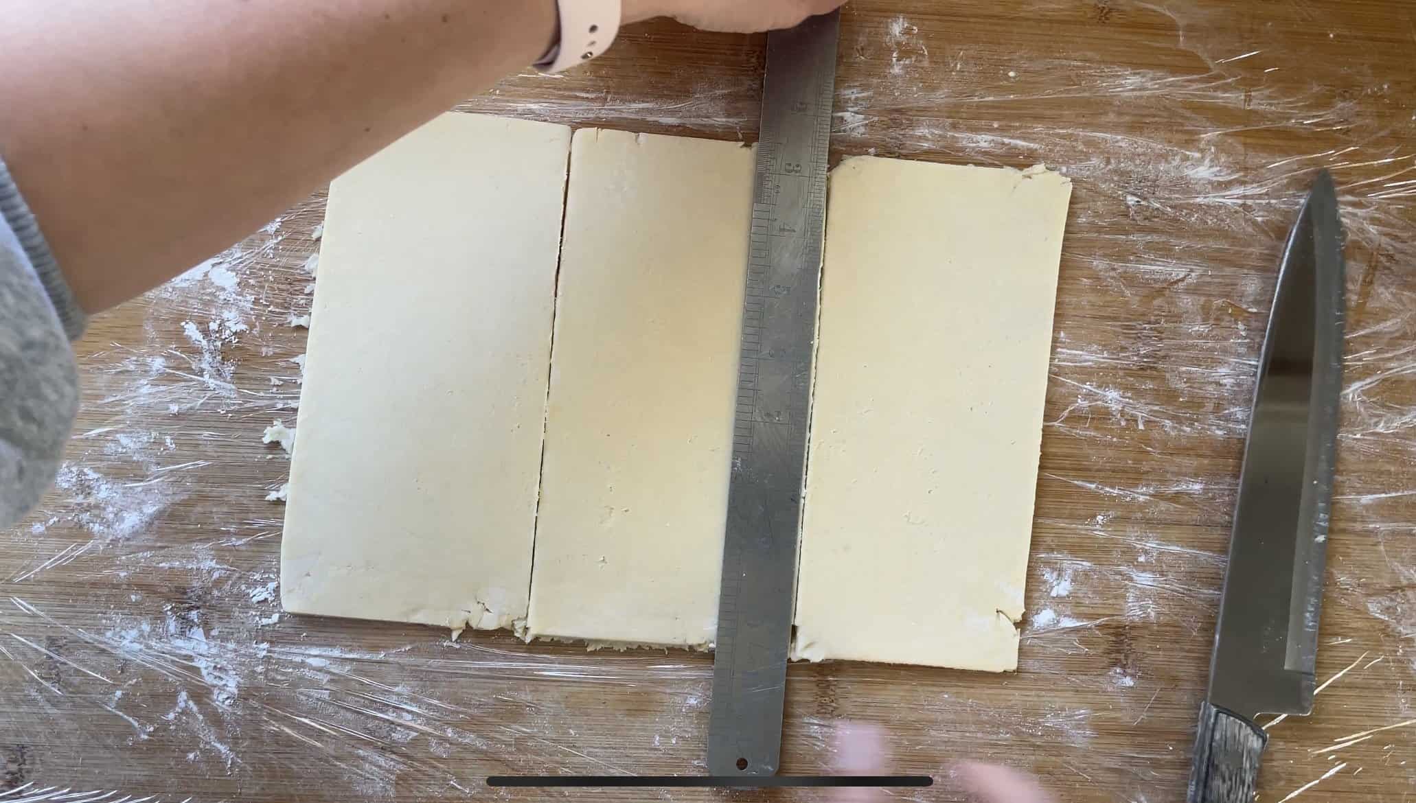 cutting croissant dough