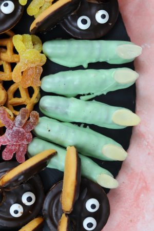 HALLOWEEN WITCHES' FINGERS MADE FROM CHOCOLATE FINGERS AND ALMOND NAILS