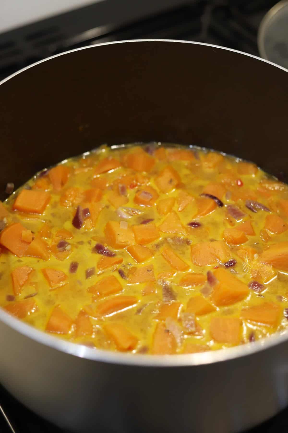 Sweet Potato Chilli and Coconut Soup - cook until the sweet potato is soft