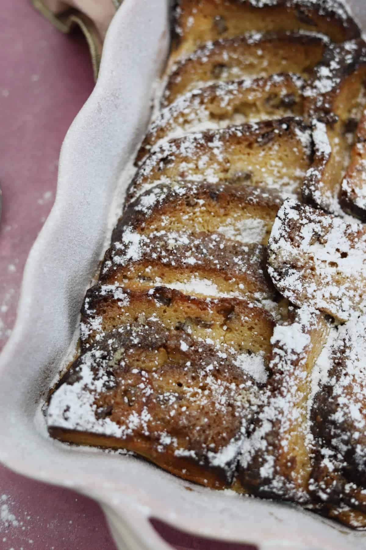 A dish of gluten free panettone bread and butter pudding.