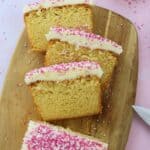gluten free vanilla loaf cake recipe slices on a chopping board.