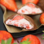 Frozen strawberry yoghurt bites covered in chocolate.