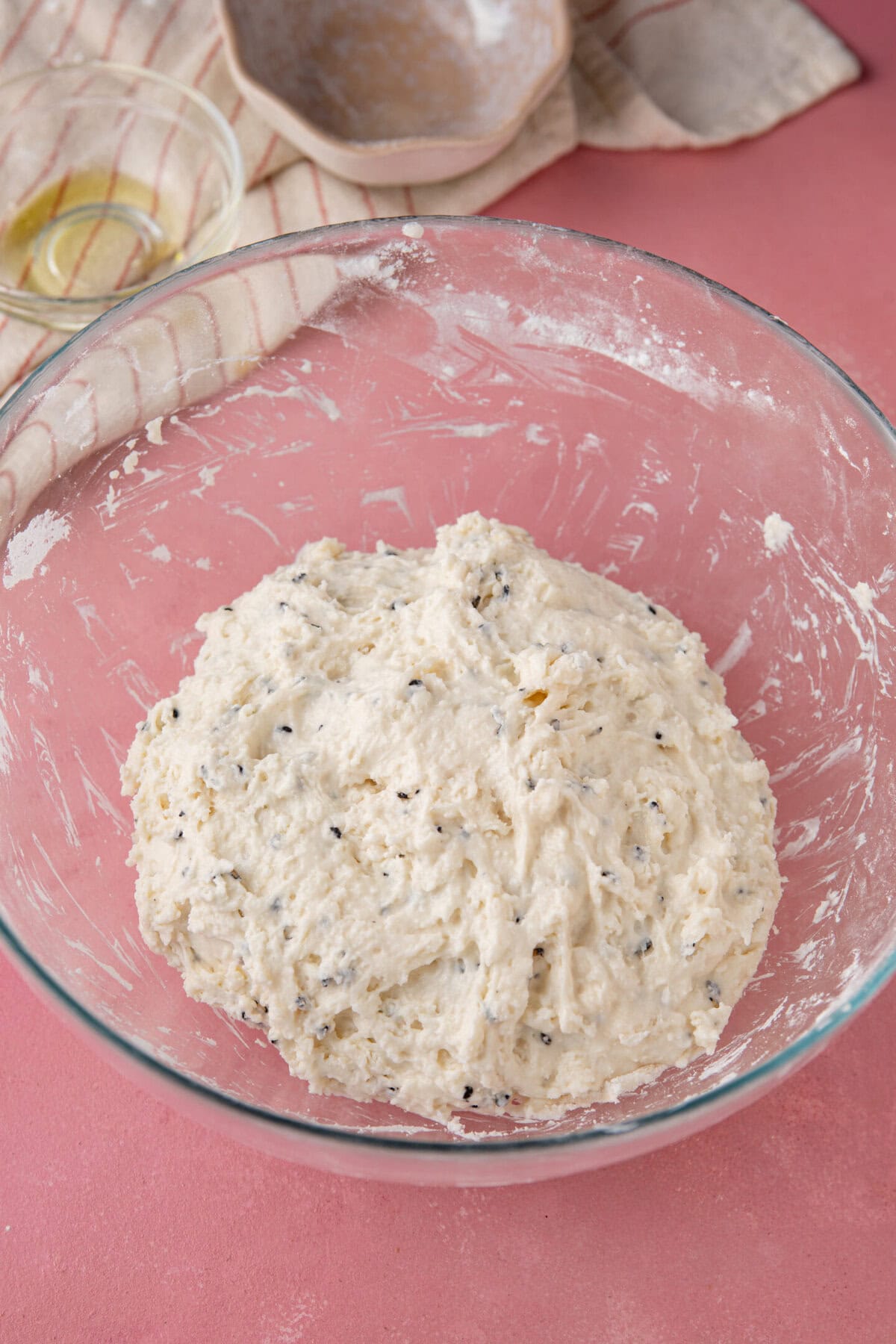 Process shot for gluten free naan bread recipe showing the dough in a mixing bowl.