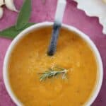 A bowl of butternut squash and sweet potato soup.