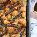 A gluten free toad in the hole with gravy.