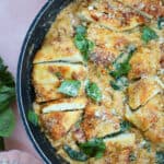 Close up shot of Marry Me Chicken Orzo with crispy chicken chunks and creamy orzo in a pan.
