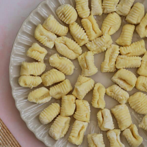 A plate of gluten free gnocchi dumplings.