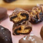 Dates stuffed with peanut butter and coated in chocolate.