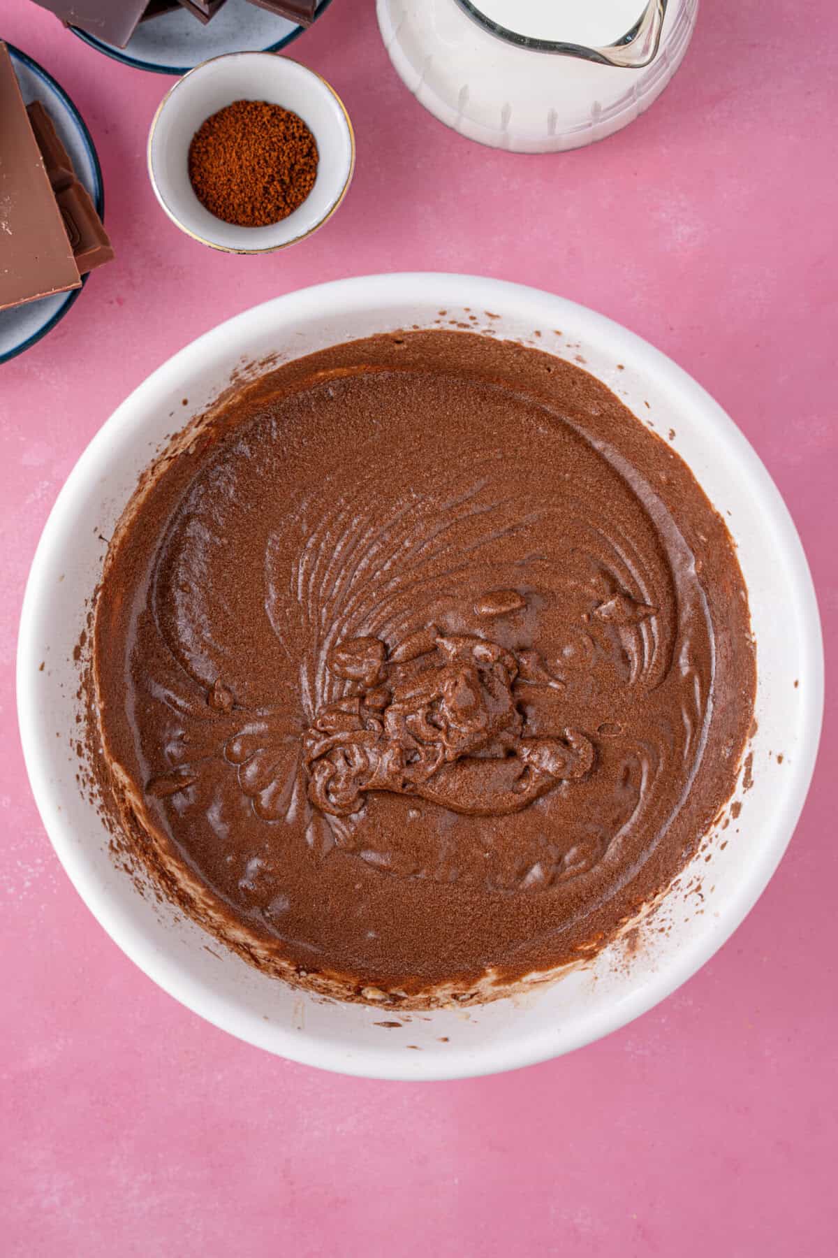 A bowl with chocolate coffee cake mix.