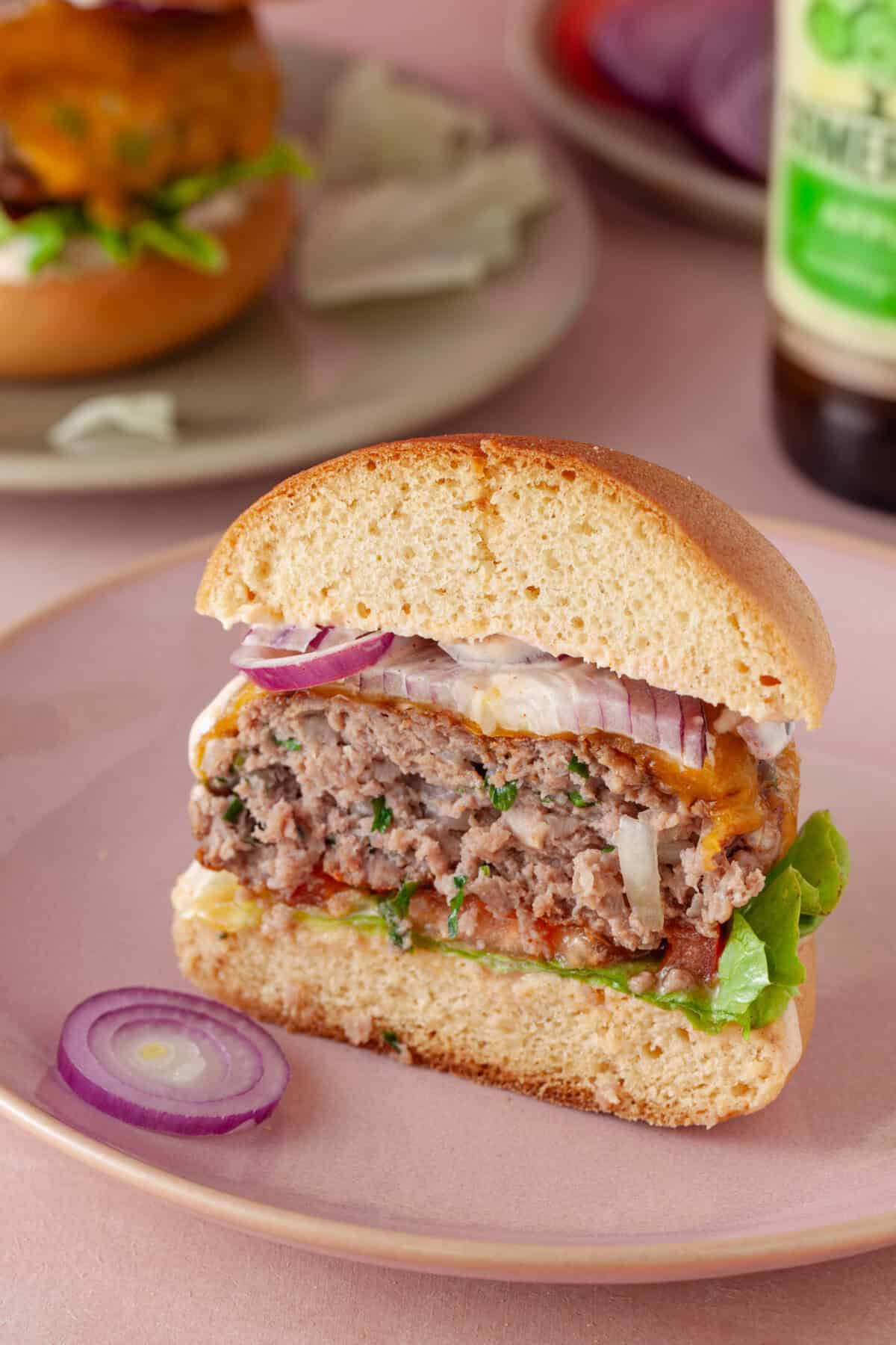 A gluten free beef burger cross section.