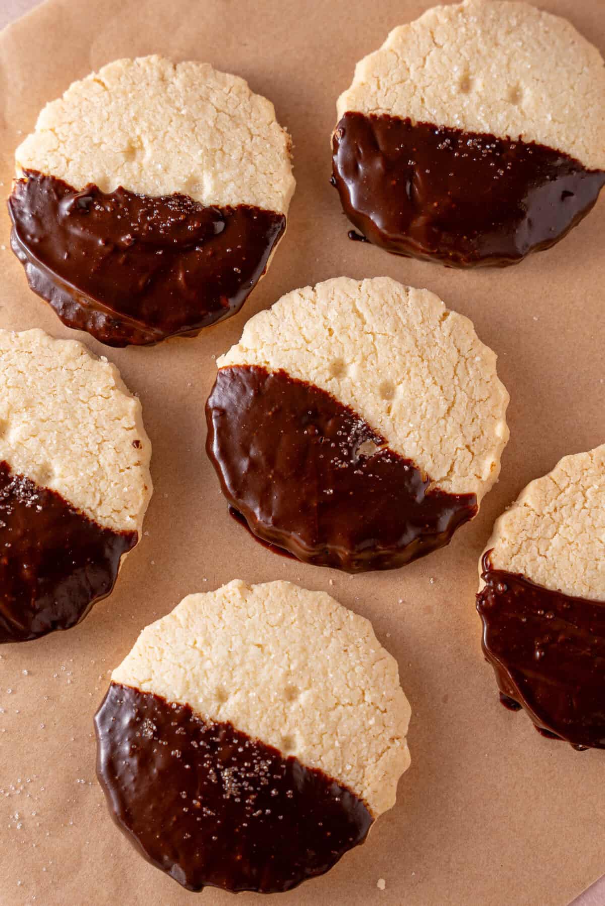 Gluten free shortbread biscuits half-dipped in chocolate.