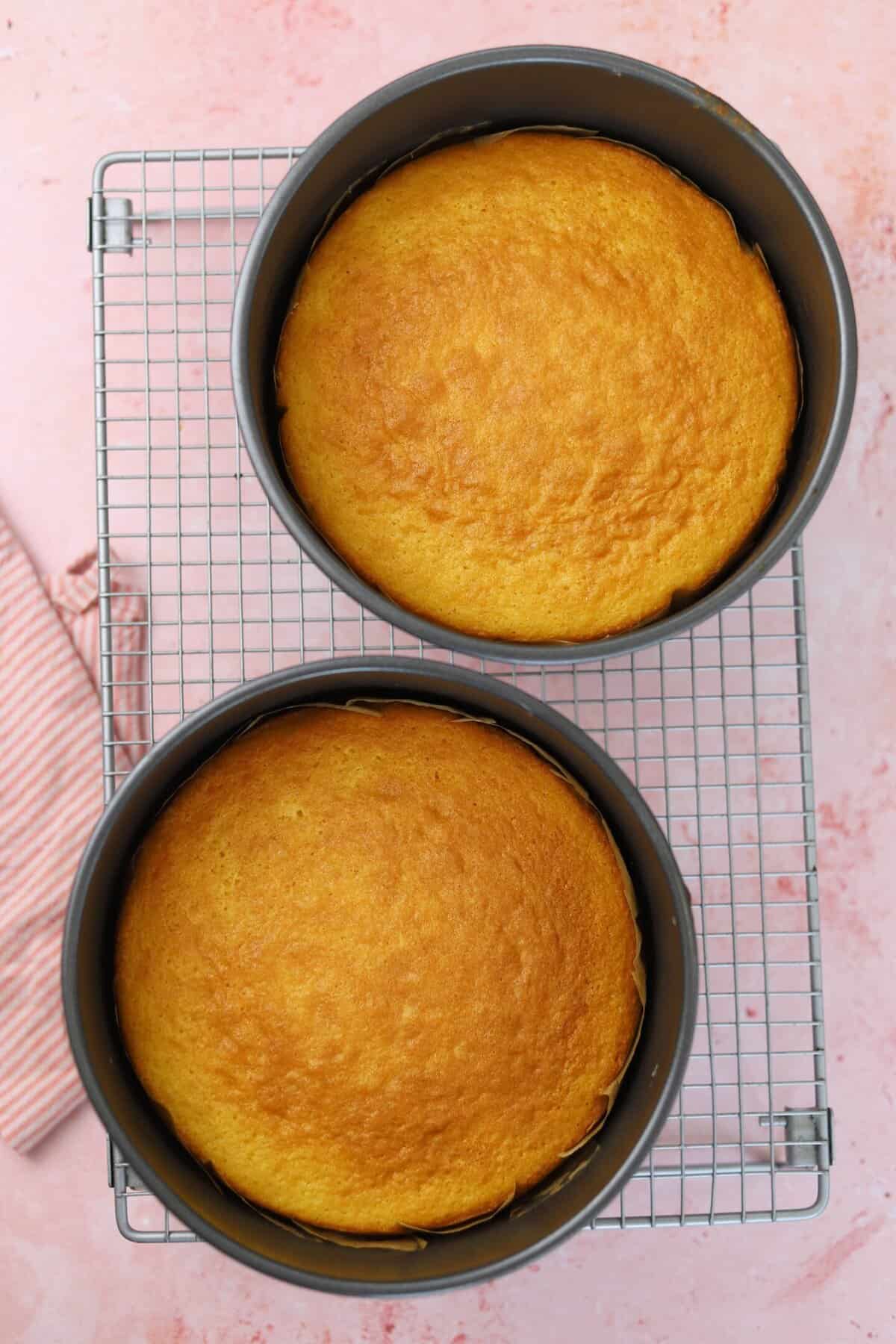 Cooling the baked cakes on a rack.