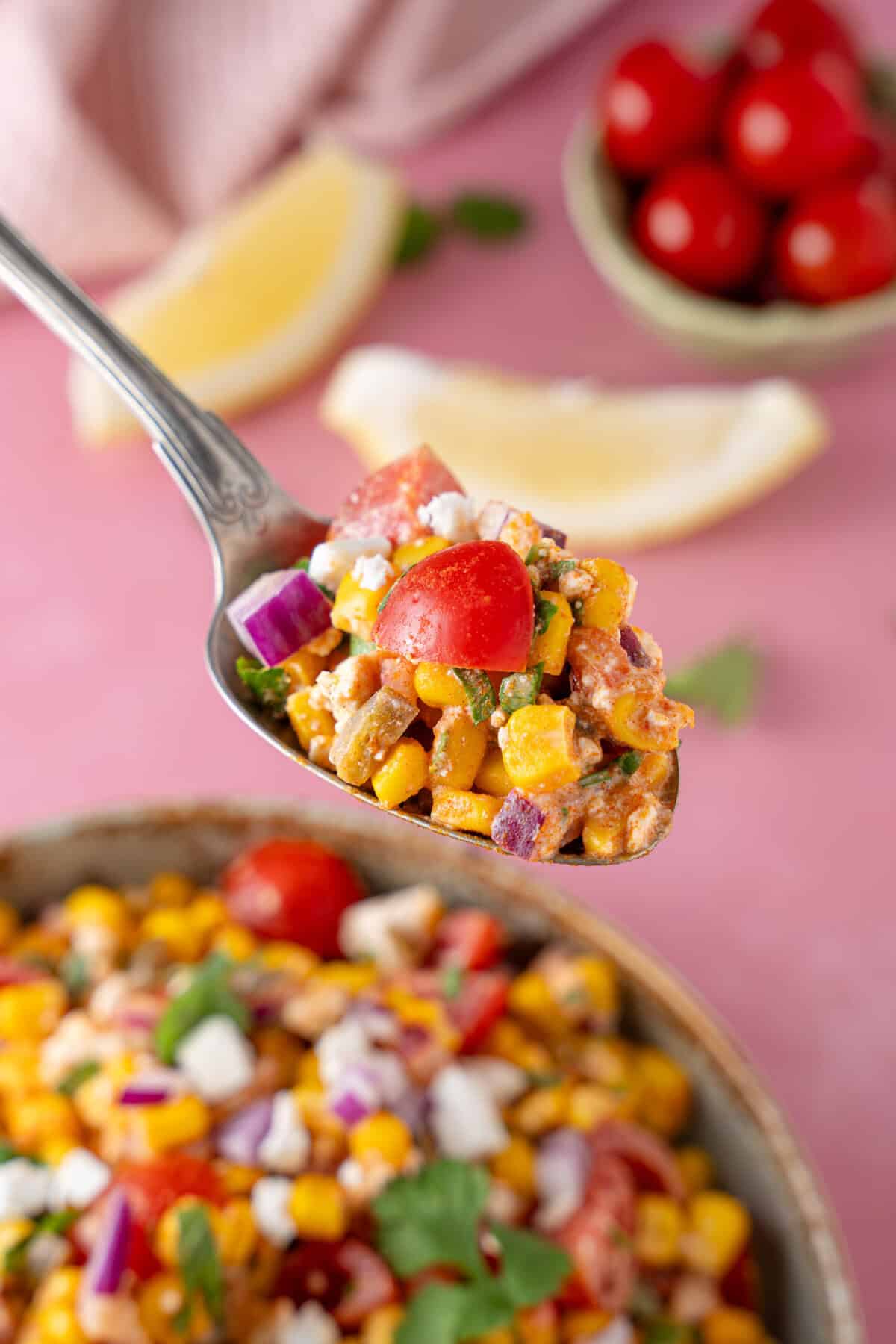 A spoonful of Mexican corn salad.