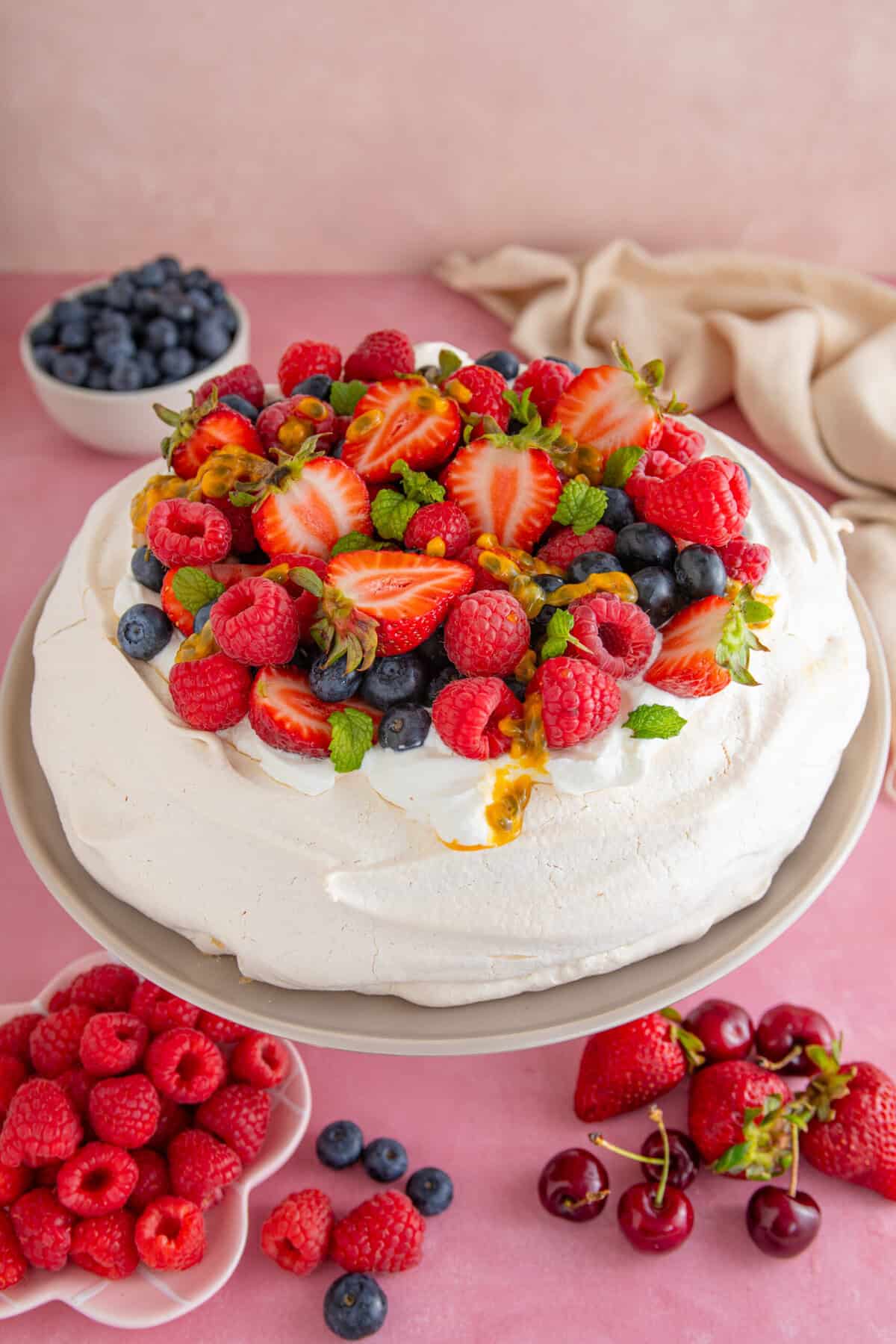 Gluten-free pavlova naturally meringue with whipped cream berries for impressive showstopper dessert