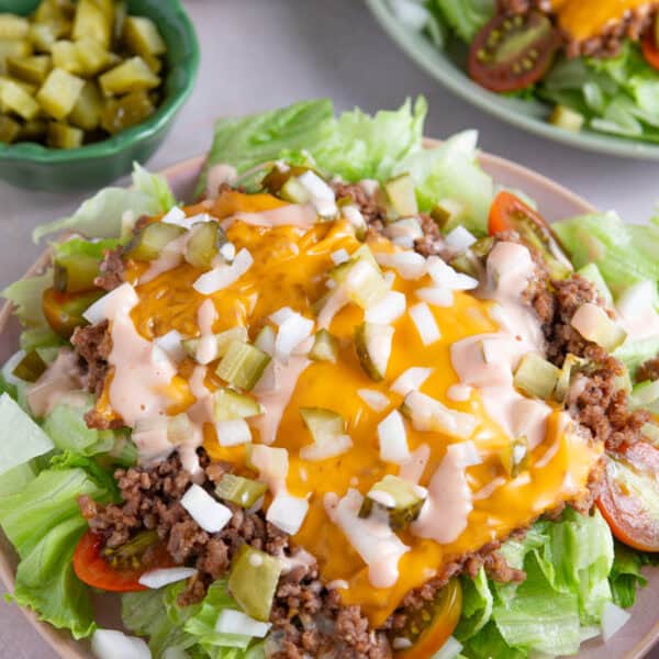 A bowl of Big Mac Salad with beef mince, cheese and burger sauce.