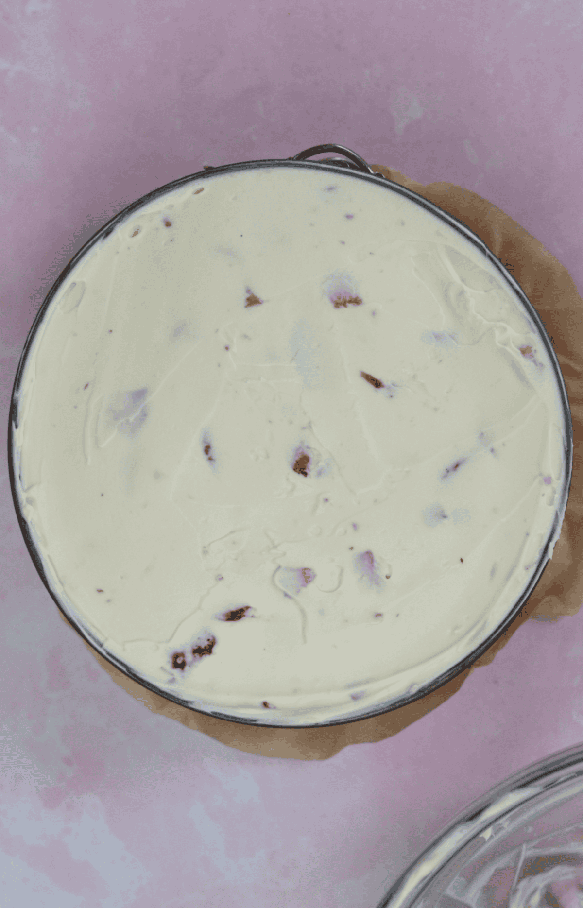 Spread the cheesecake topping on top of the biscuit base and chill.