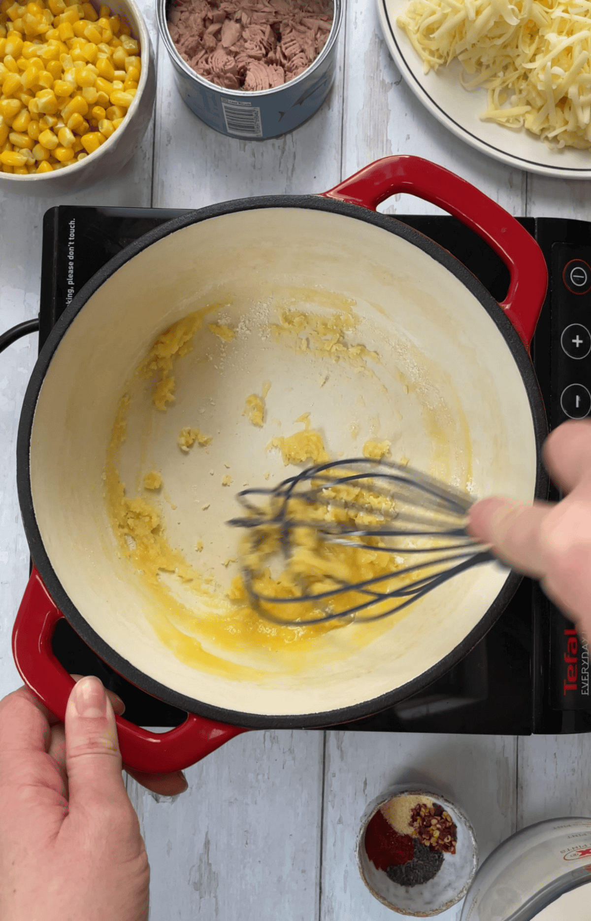 Whisk the butter and flour to form a roux.