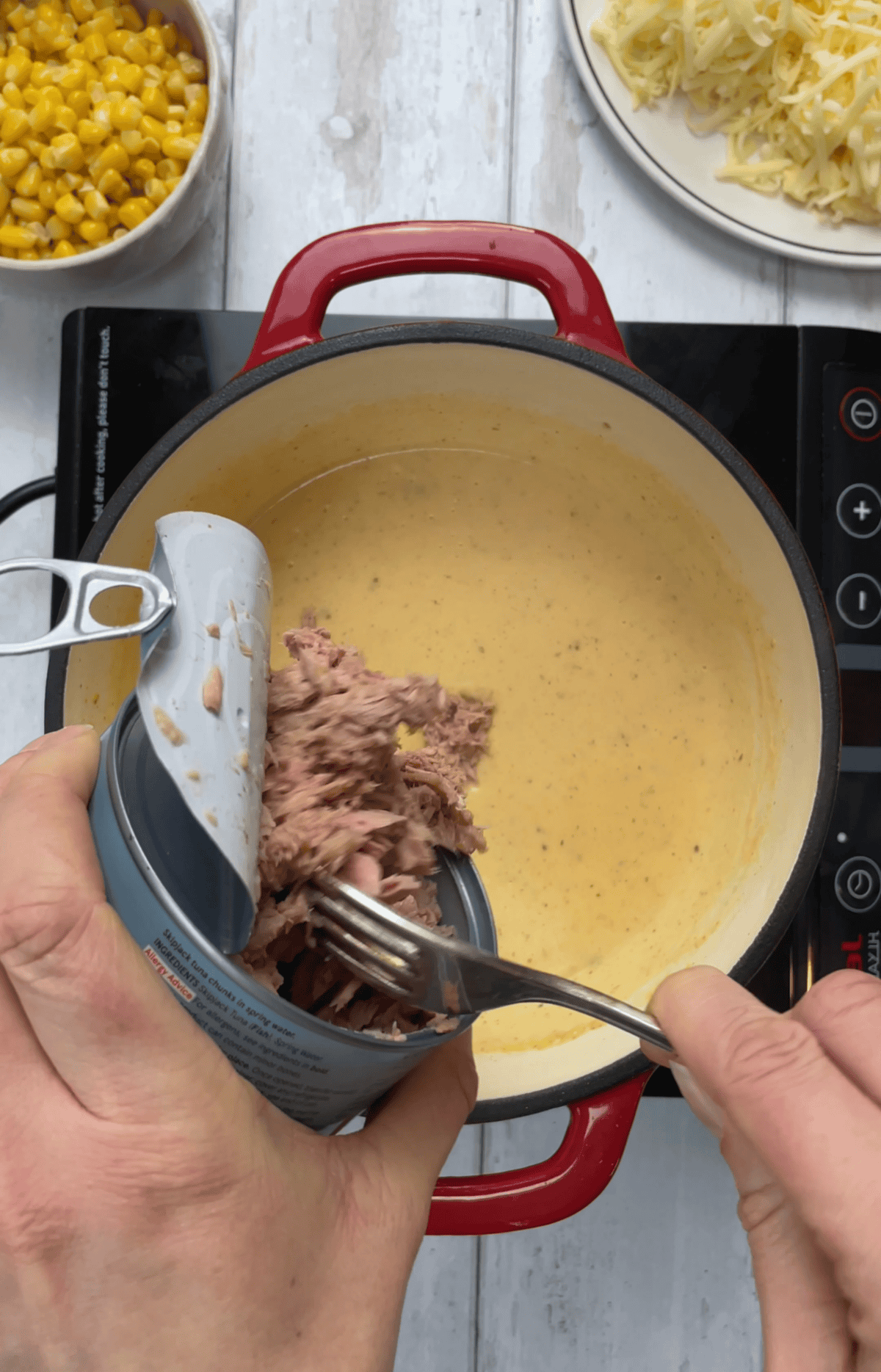 Add the drained tuna to the sauce and mix well.