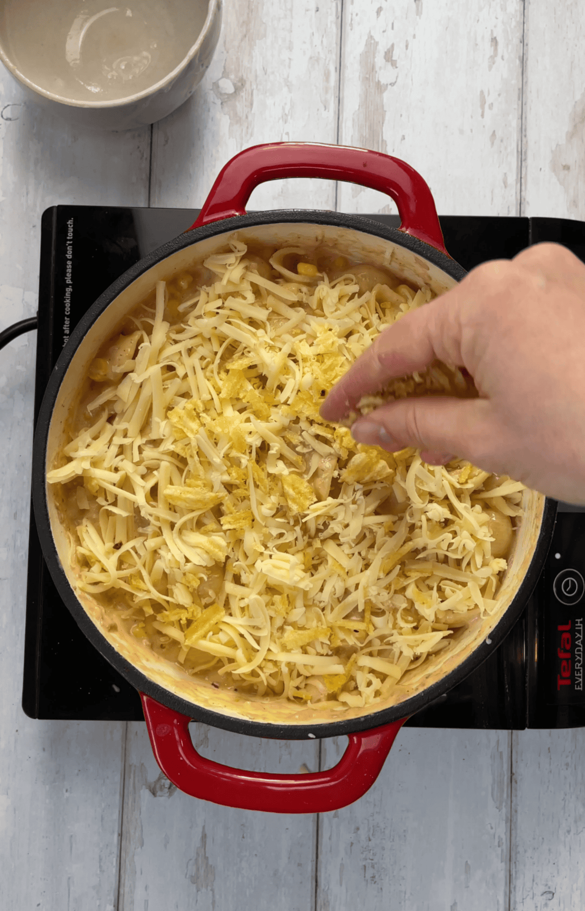 Sprinkle the cheese over the pasta and bake.