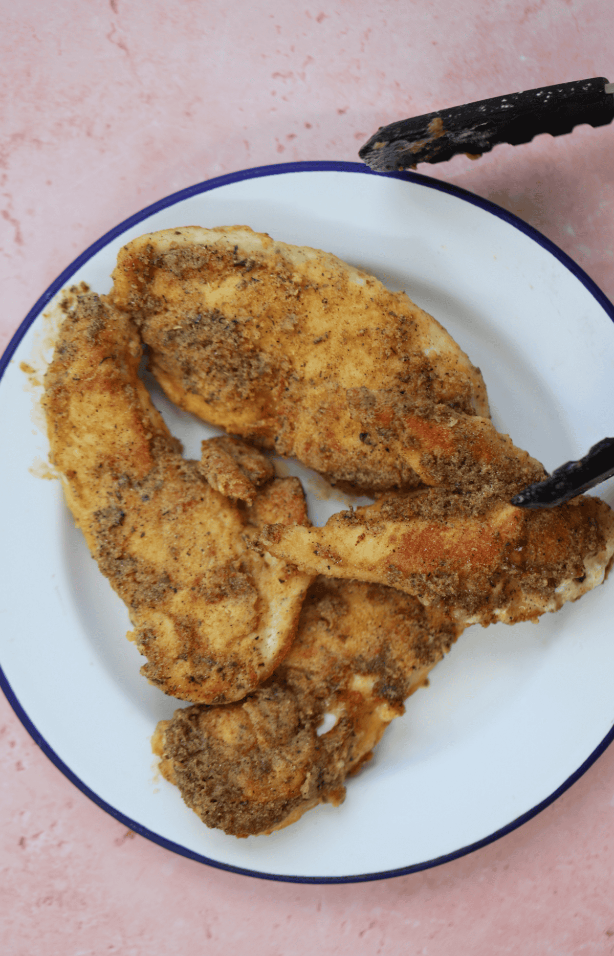 Fry the chicken breast until golden.