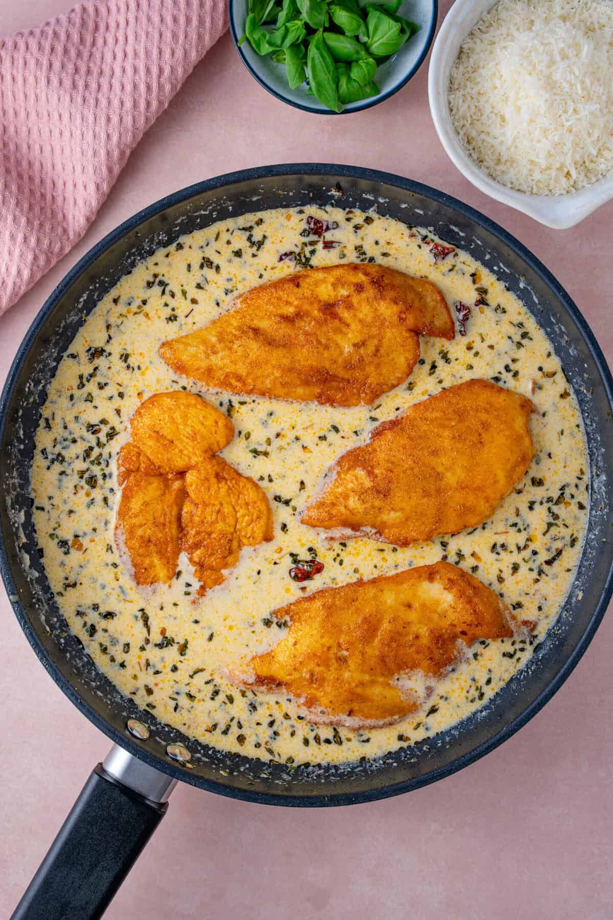 Add the sauce ingredients and the chicken back to the pan.