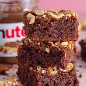 A stack of gluten free Nutella brownies.