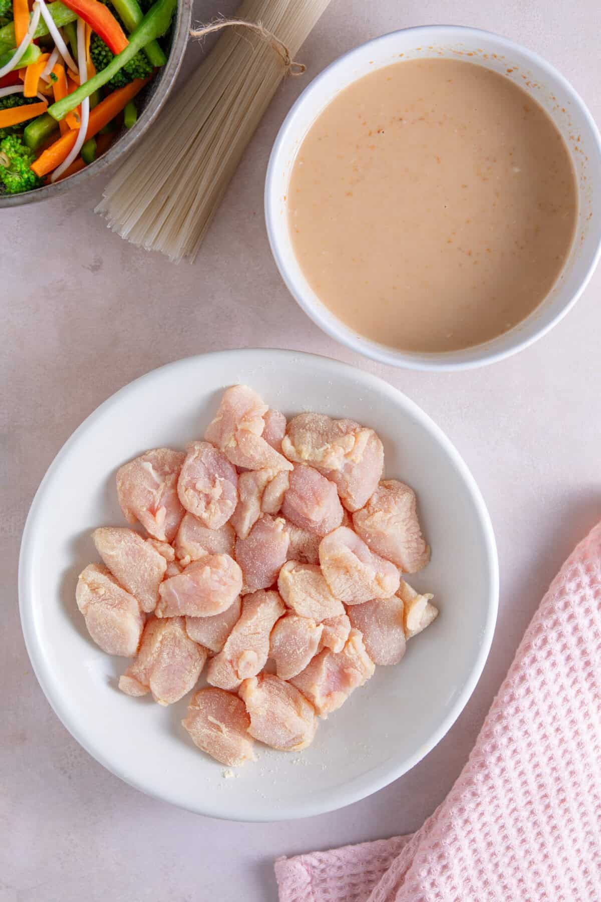Coat the chicken in cornflour and mix up the sauce ingredients.