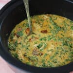 Slow cooker tuscan chicken in a crockpot.