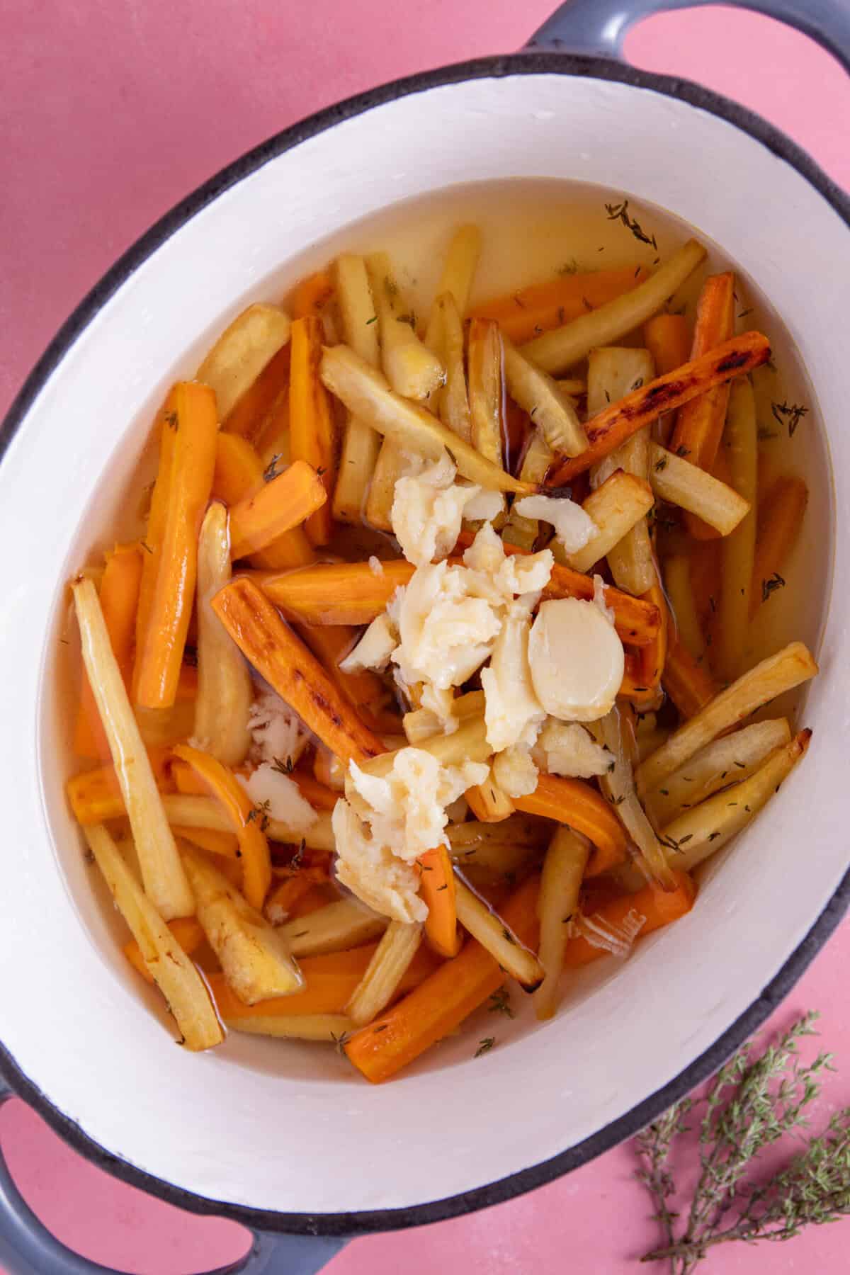 Add the roasted veg and garlic to a large pan with the vegetable stock.