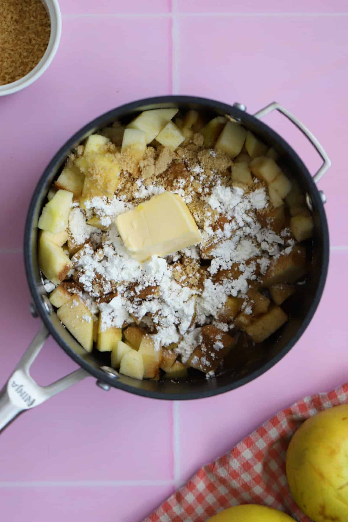 Add the ingredients for the apple turnover filling to a saucepan.