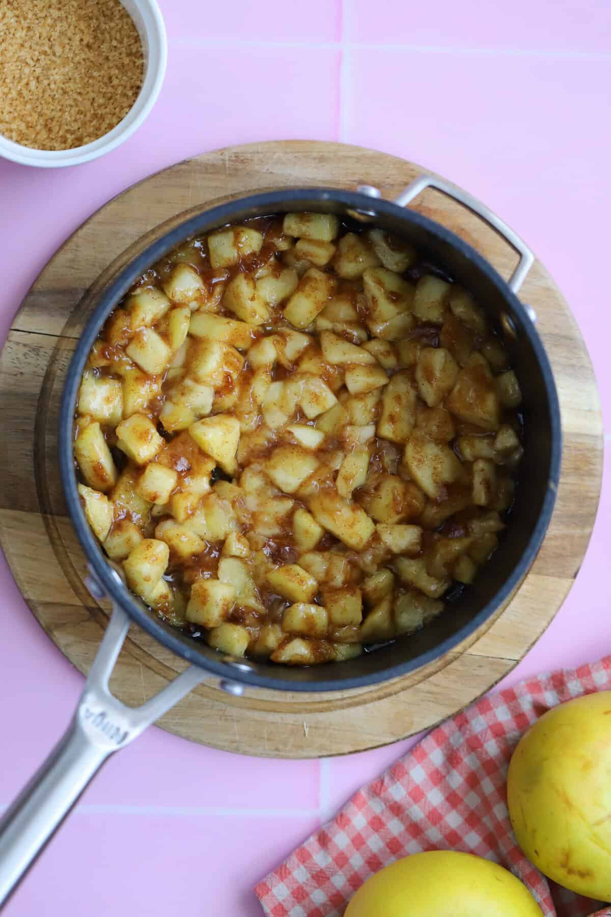 Cook the apple turnover filling on a low heat then leave to cool.