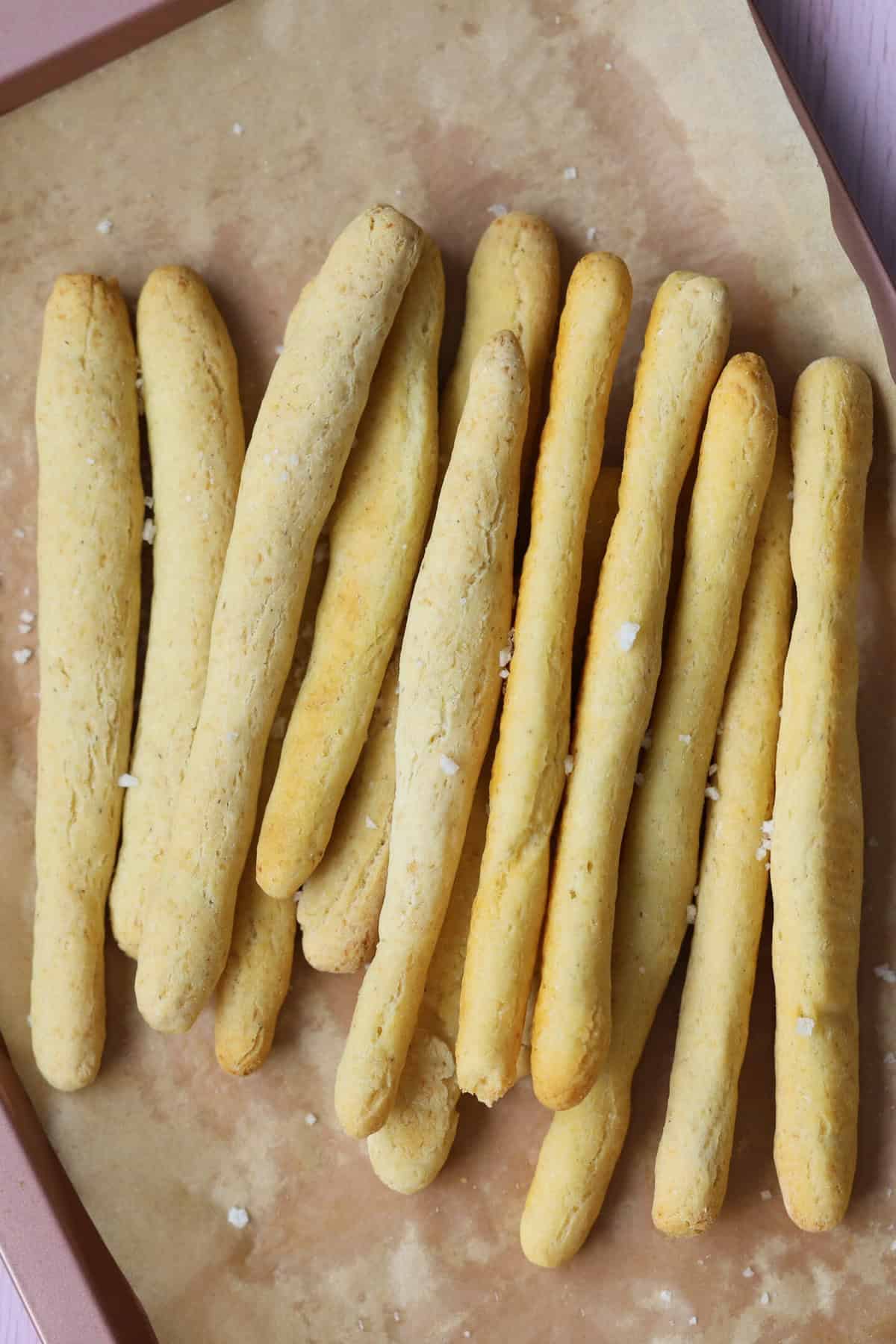A tray of gluten free breadsticks.