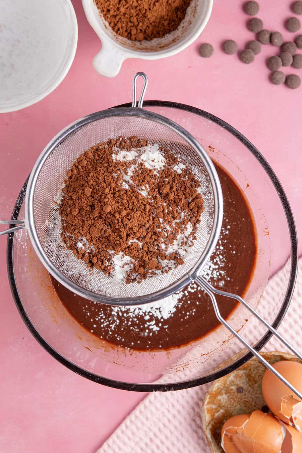 Sieve in the gluten free flour and cocoa powder.