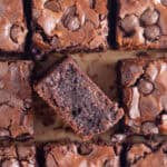 Gluten free brownies on a sheet of baking paper.