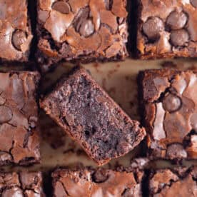 Gluten free brownies on a sheet of baking paper.