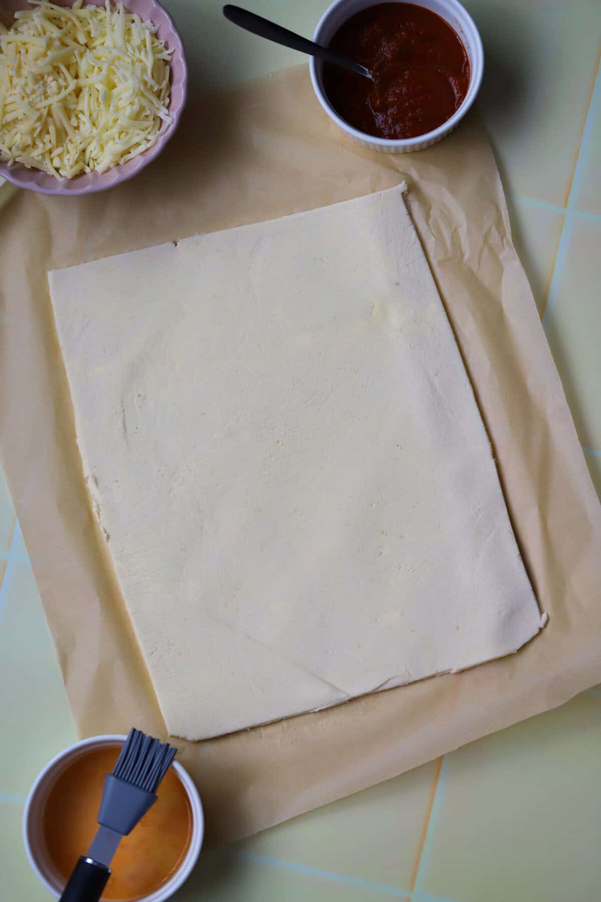 Roll out your gluten free puff pastry and cut into a large rectangular shape.