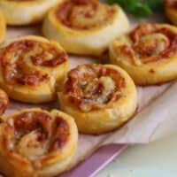A tray of gluten free pizza pinwheels.