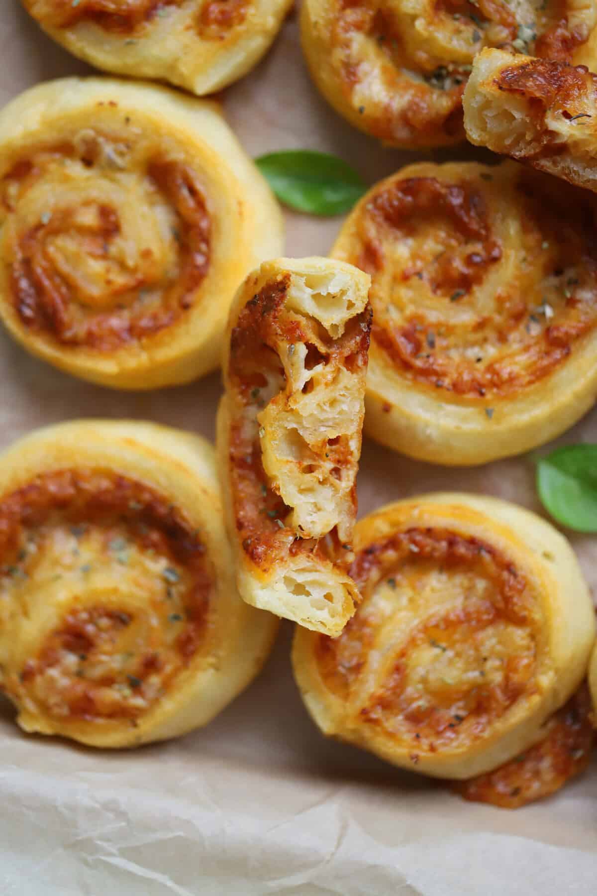 Cross section of a gluten free puff pastry pizza pinwheel.