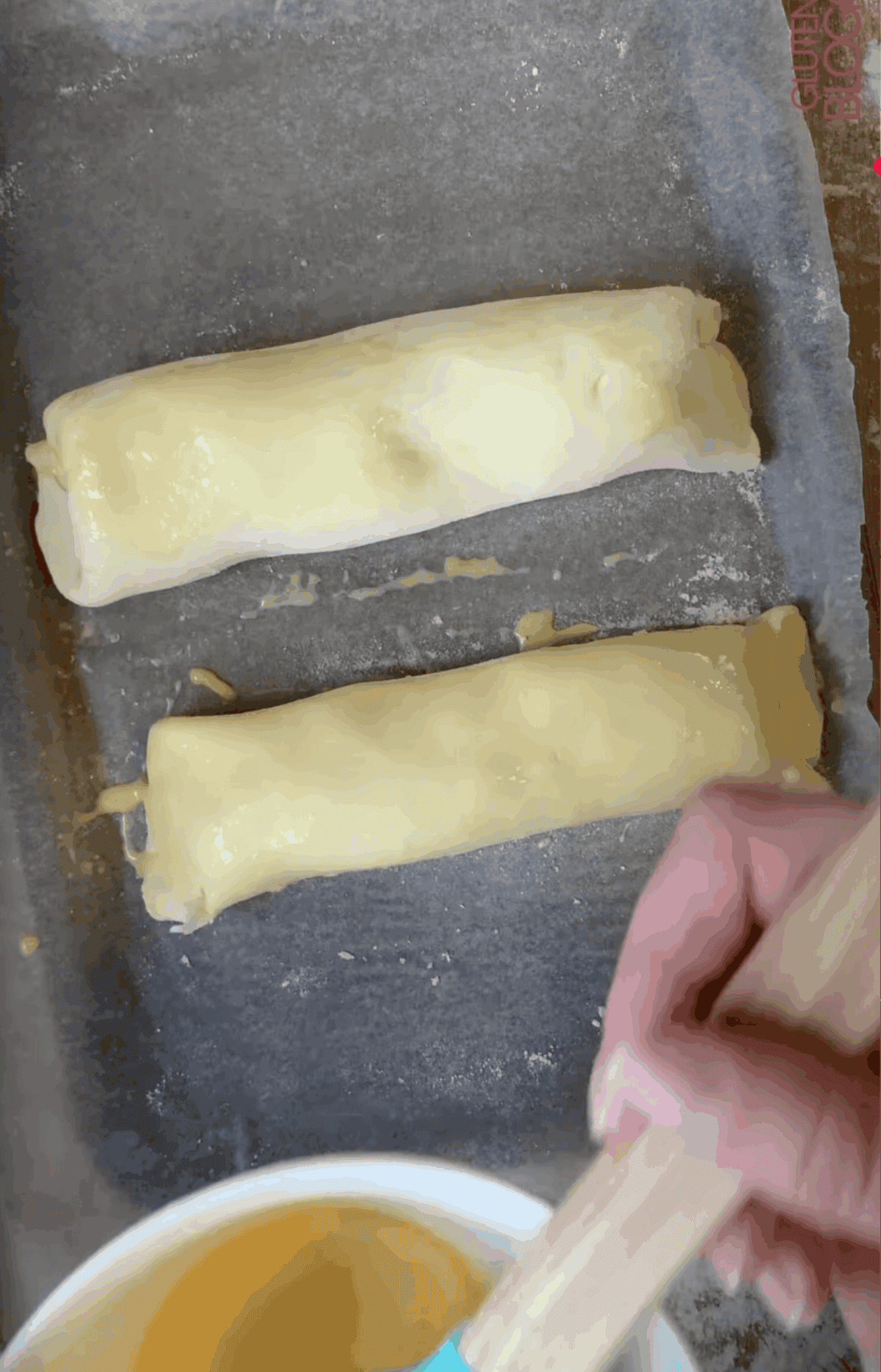 Brush the sausage rolls with egg wash.
