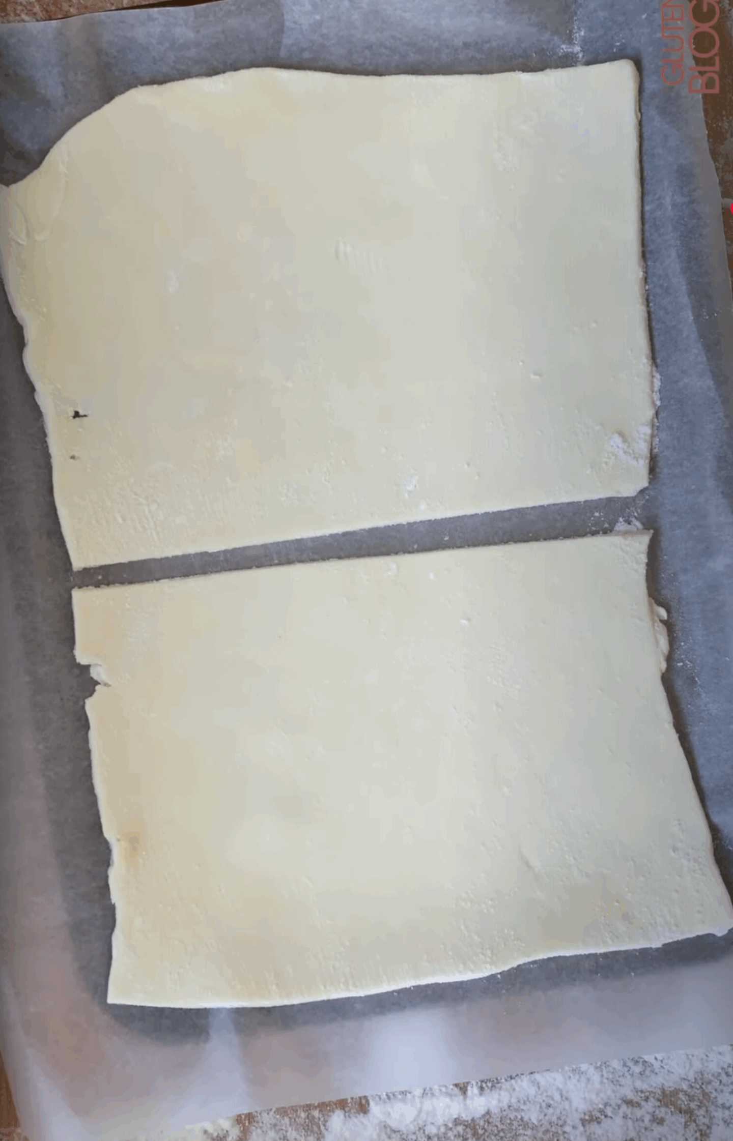 A sheet of gluten free puff pastry cut into 2 rectangles.