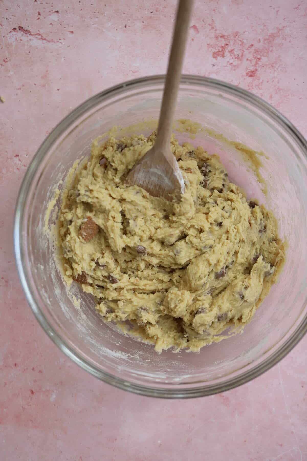 A bowl of chocolate chip cookie dough.
