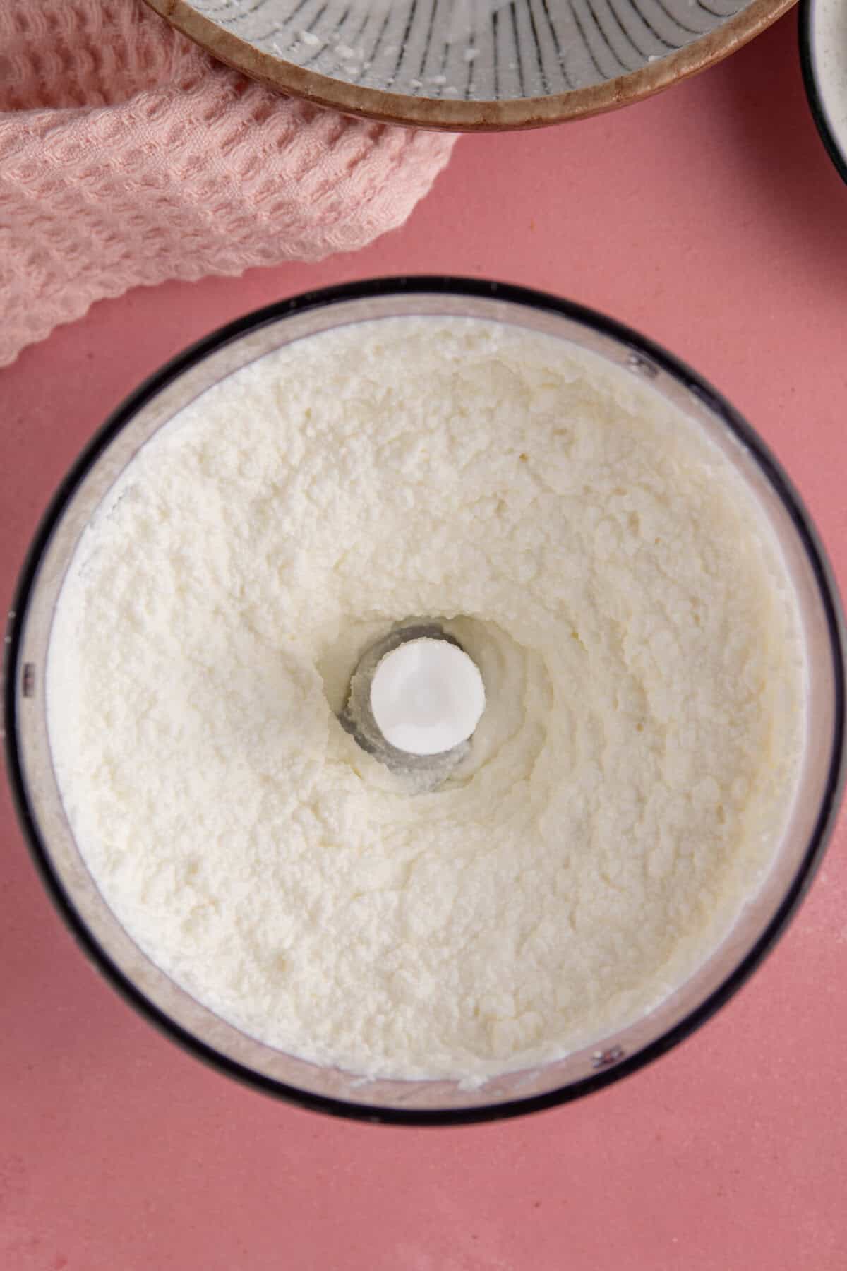 Whip the cottage cheese in a food processor until smooth.