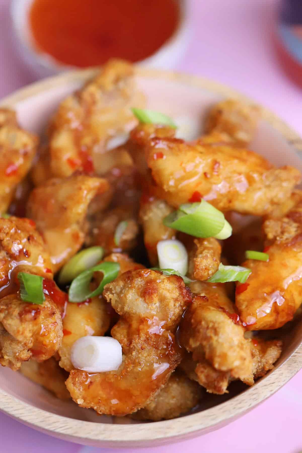 A bowl of air fryer crispy chilli chicken.