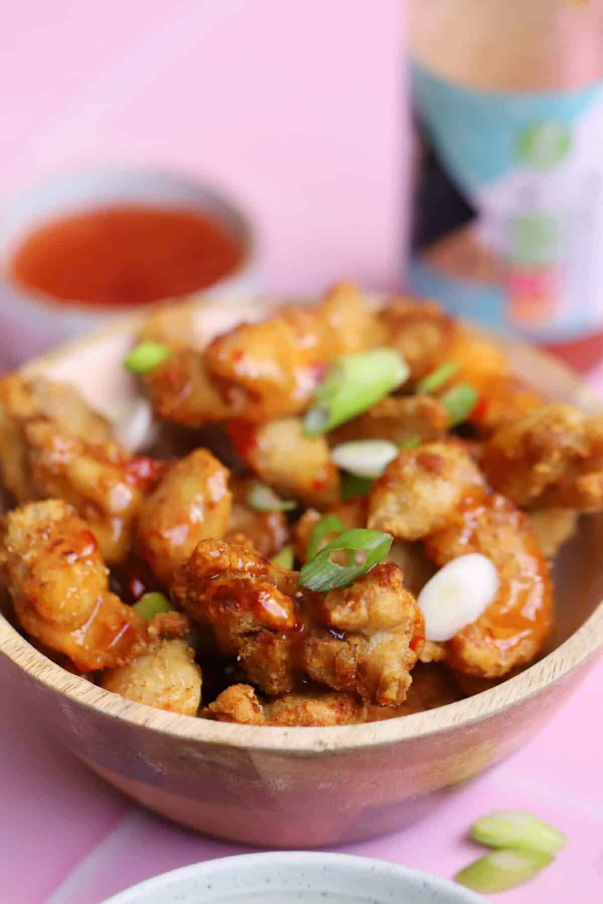 A bowl of air fryer crispy chilli chicken.