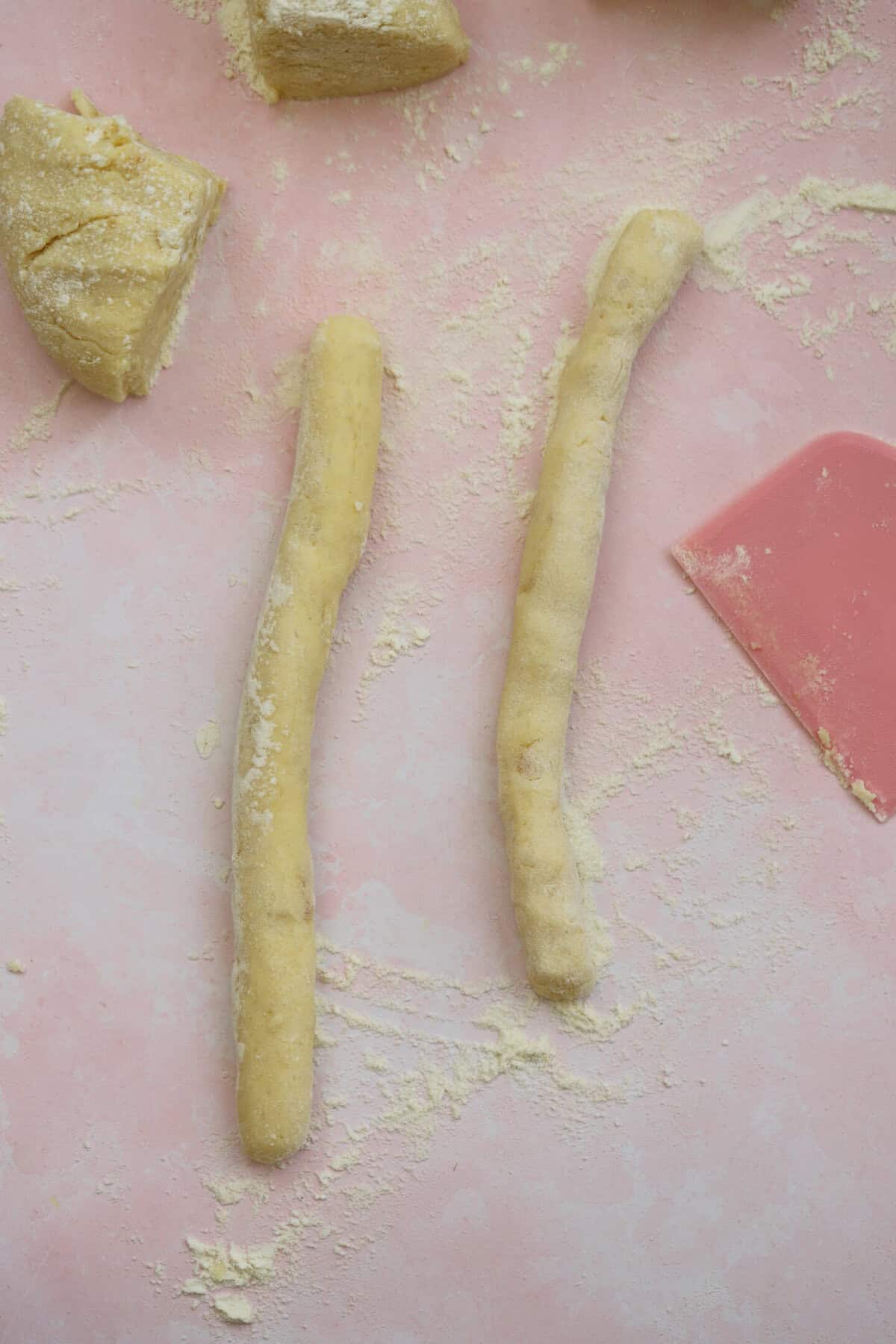 Roll each quarter into two long sausage shapes, using your hands.