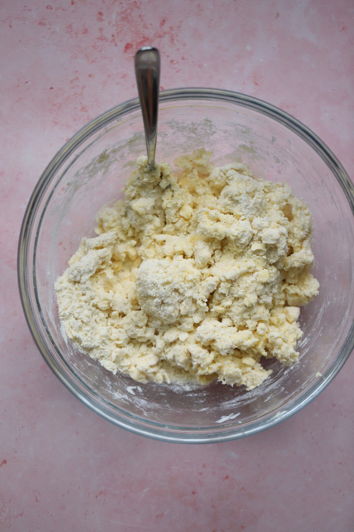 Gradually add the ice cold water to form the pastry dough.