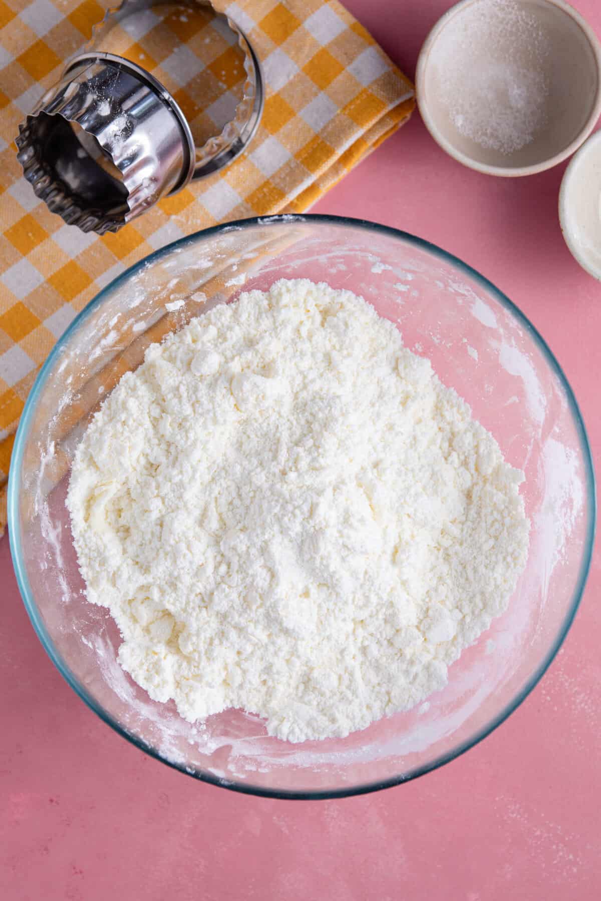 Rub the butter into the dry ingredients to create a breadcrumb-like texture.